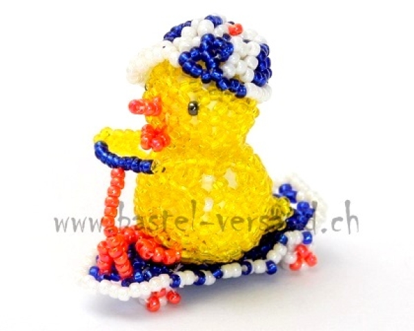 Küken auf Trotti (blau)