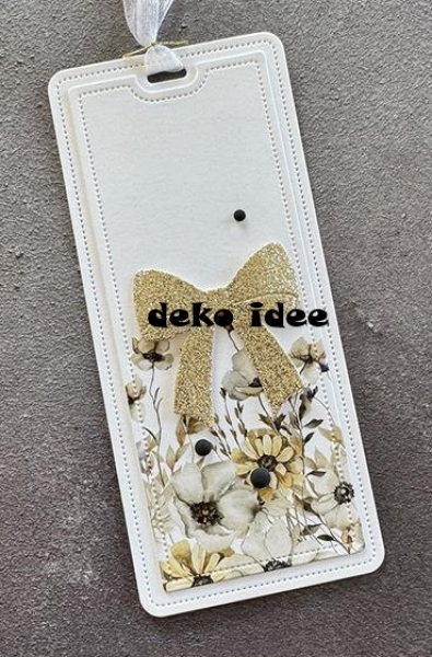 Simple and Basic die Beautiful bows on a tag