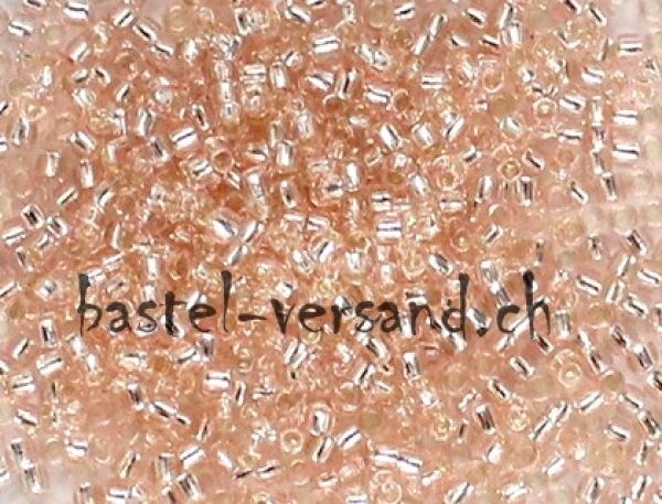 Toho Round 15/0 silver-lined rosaline