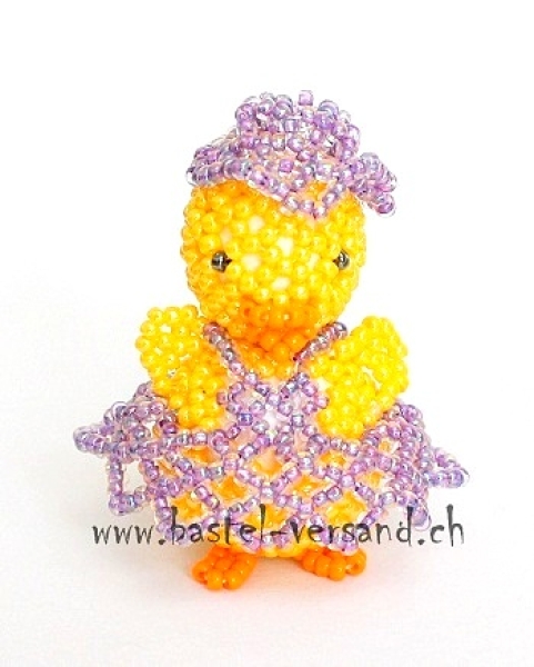 Küken mit lila Schürze