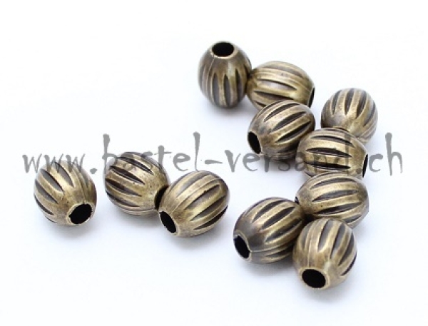 Metallperle olive messingfarbig