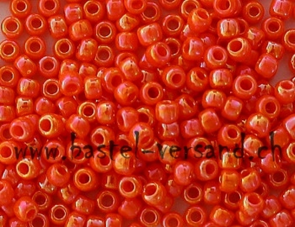Toho Rocailles-Perlen 9/0 orange irisirend 336
